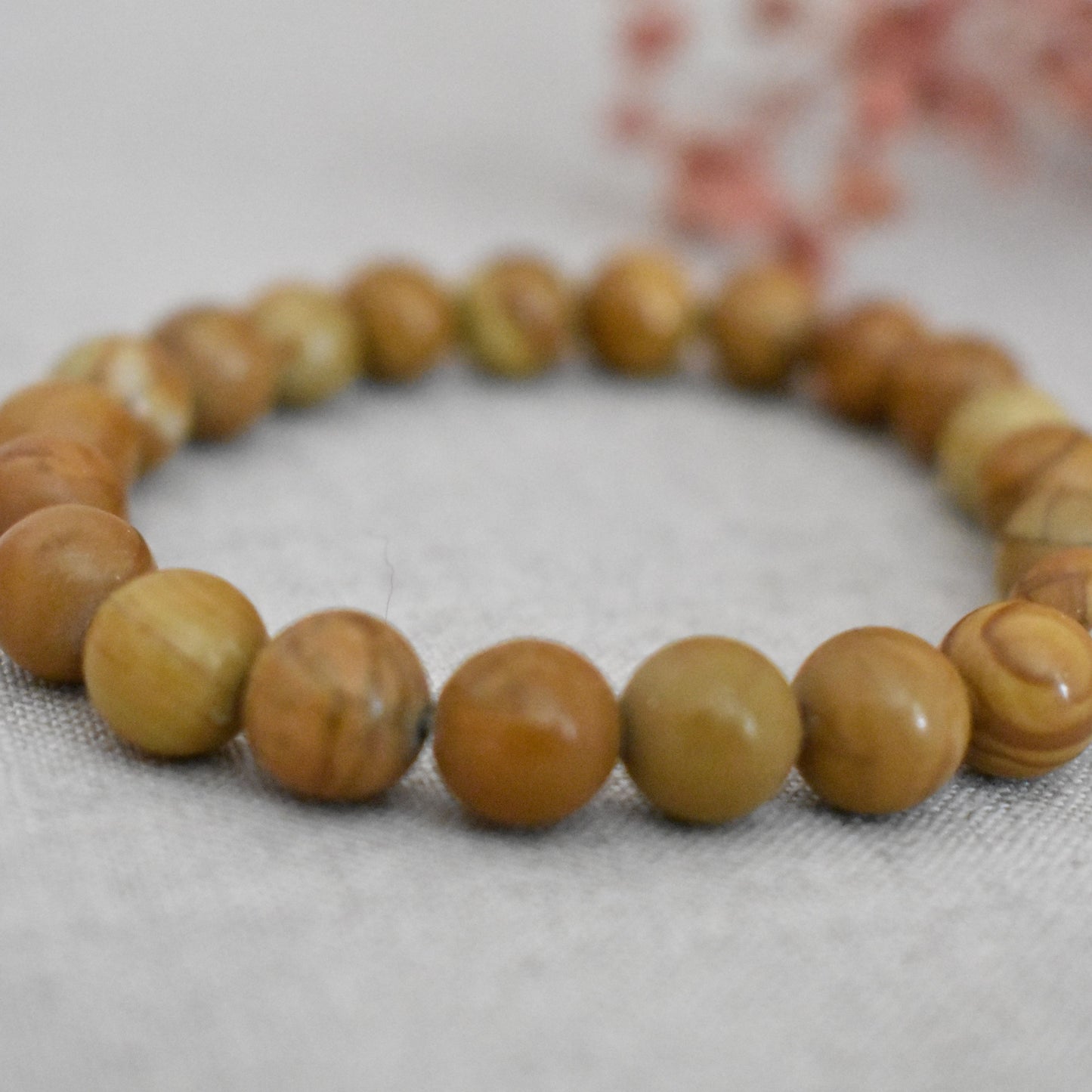 Bracelet bois fossile 8 mm · Ancrage et stabilité intérieure