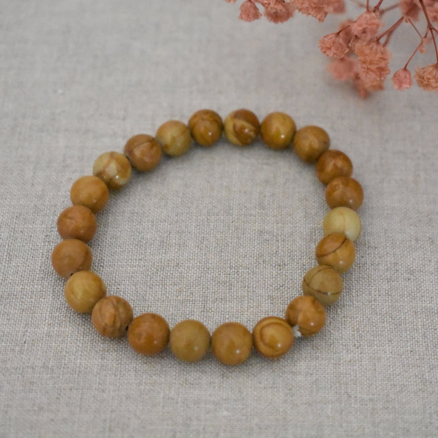 Bracelet bois fossile 8 mm · Ancrage et stabilité intérieure