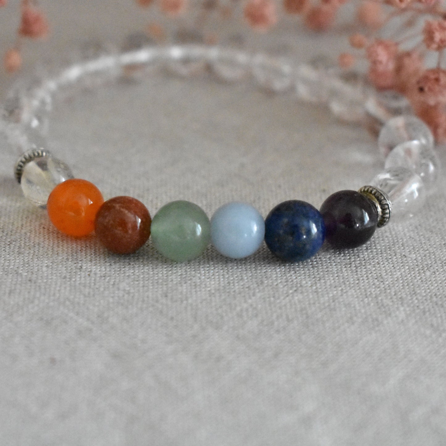 Bracelet cristal de roche 7 chakras 8 mm · Équilibre et clarté