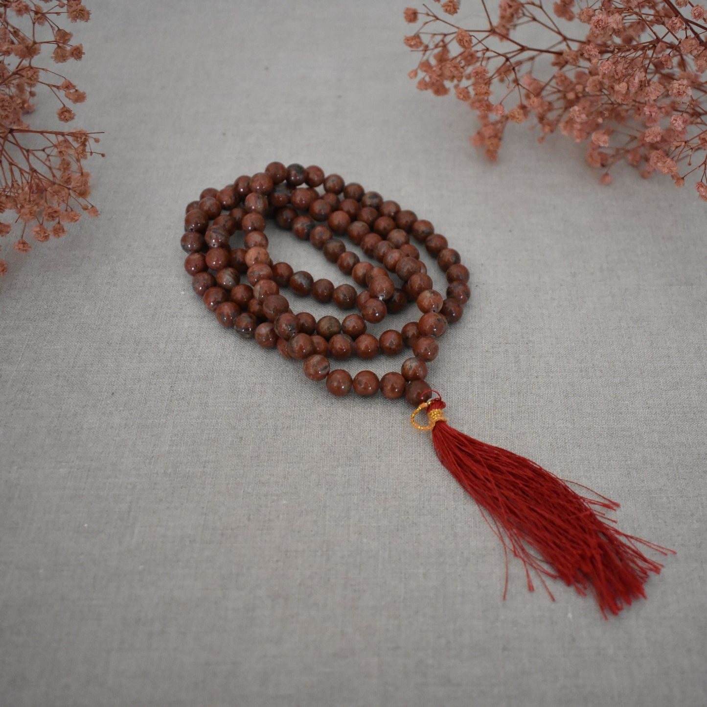 Mala jaspe rouge 108 perles – Ancrage et force intérieure