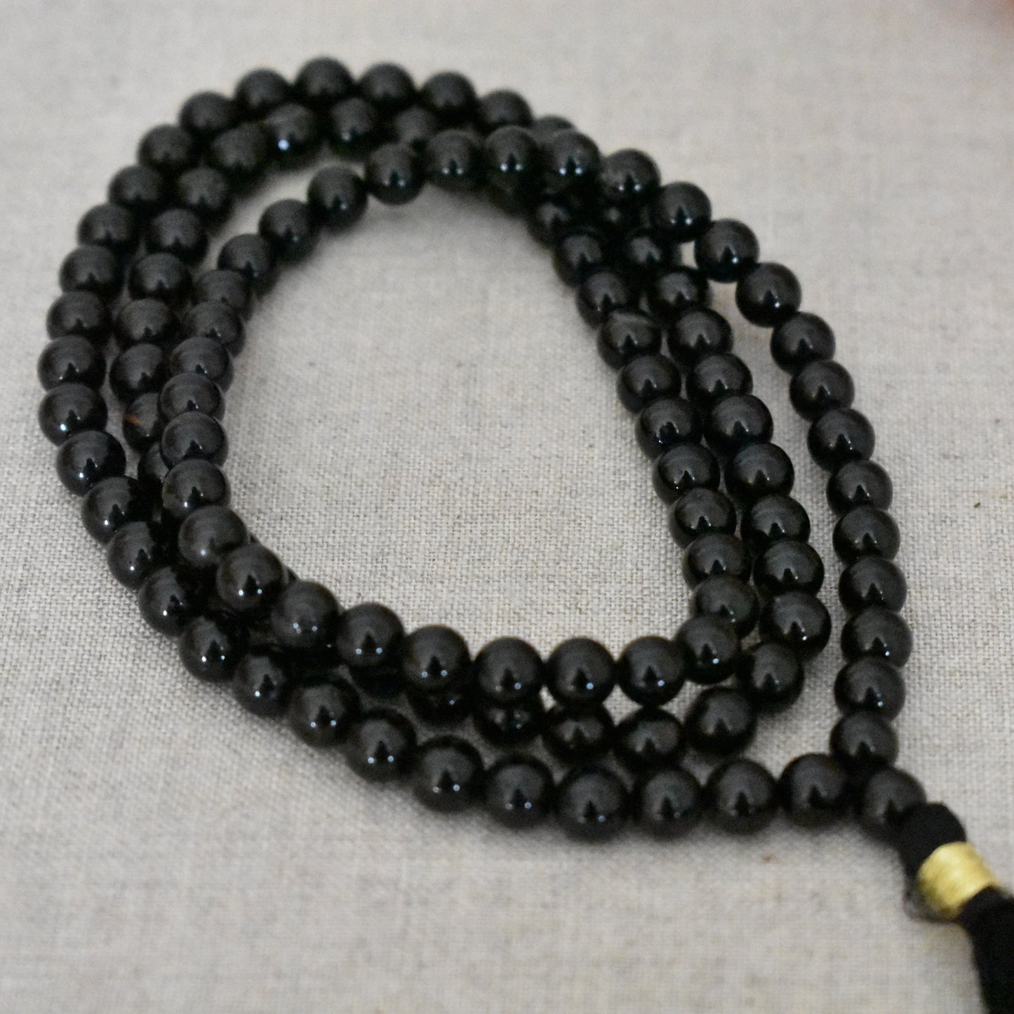 Mala onyx noir 108 perles – Protection et maîtrise de soi